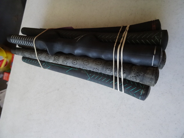 lot 103 image: 12 Misc Grips and 1 Training Grip.