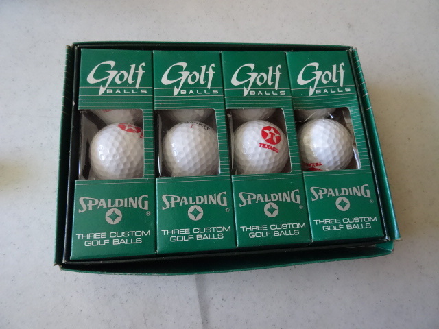 lot 106 image: 1 Dozen Spalding Golf Balls. Texaco Logo