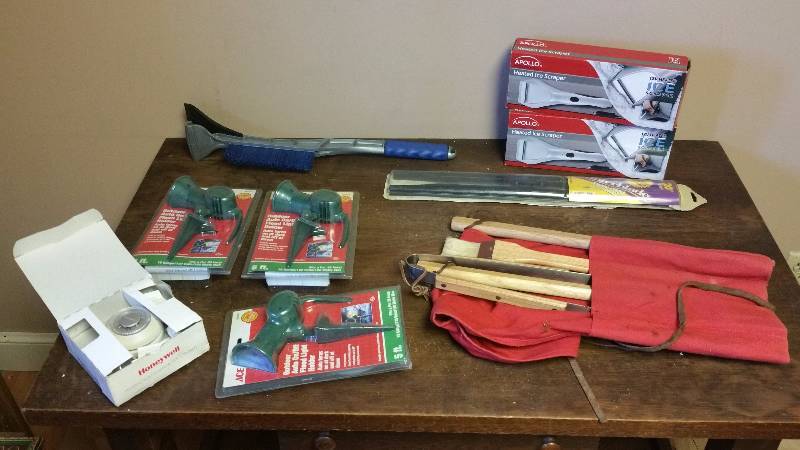 lot 148 image: Honeywell Thermostat, Outdoor Flood Light Holders, Heated Ice Scapers, Etc.