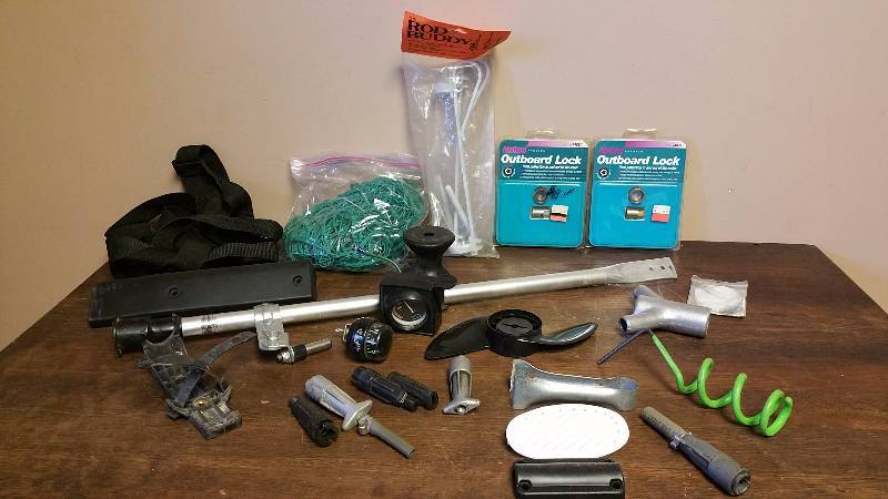 lot 114 image: Outboard Locks, Rod Buddy, Guages, Netting, and More