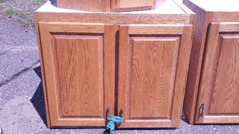 lot 142 image: Group of Oak Cabinets