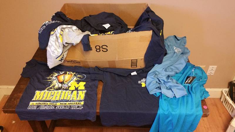 lot 335 image: Large Group of Brand New Golf Shirts & T-Shirts