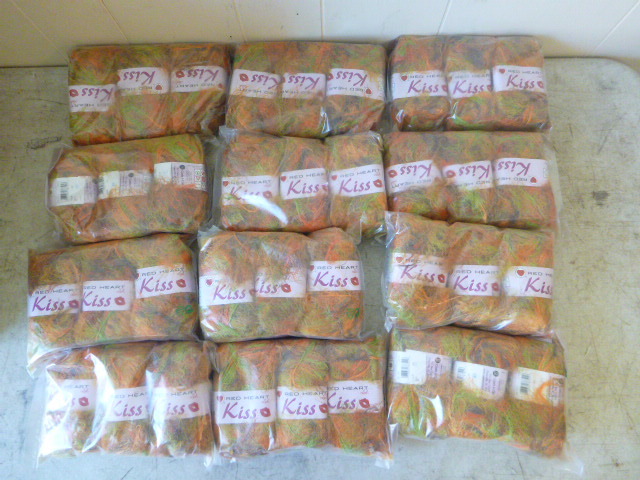 12 Packs of Red Head Kiss Yarn