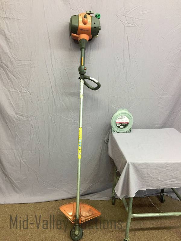 lot 8 image: Husgvarna lawn trimmer