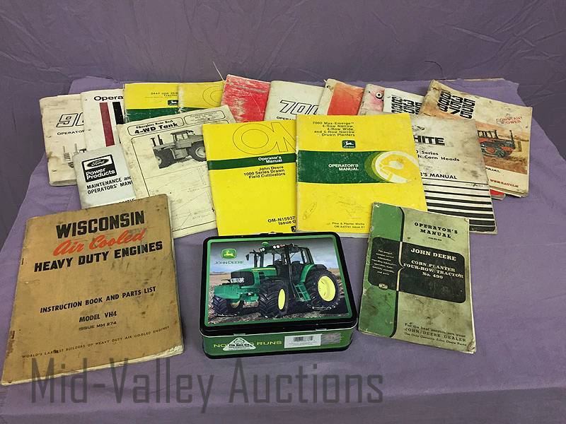 lot 44 image: Farm Implement Manuals and John Deere tin