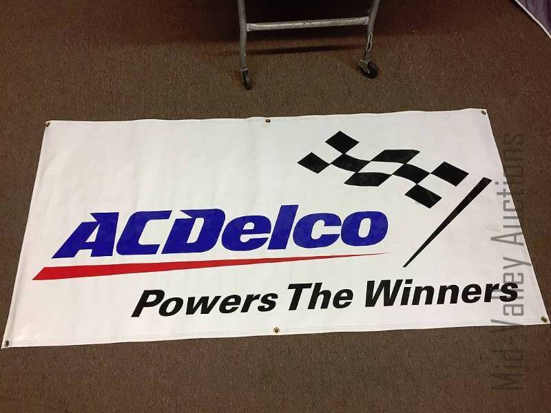 lot 50 image: AC Delco banner and framed farm picture