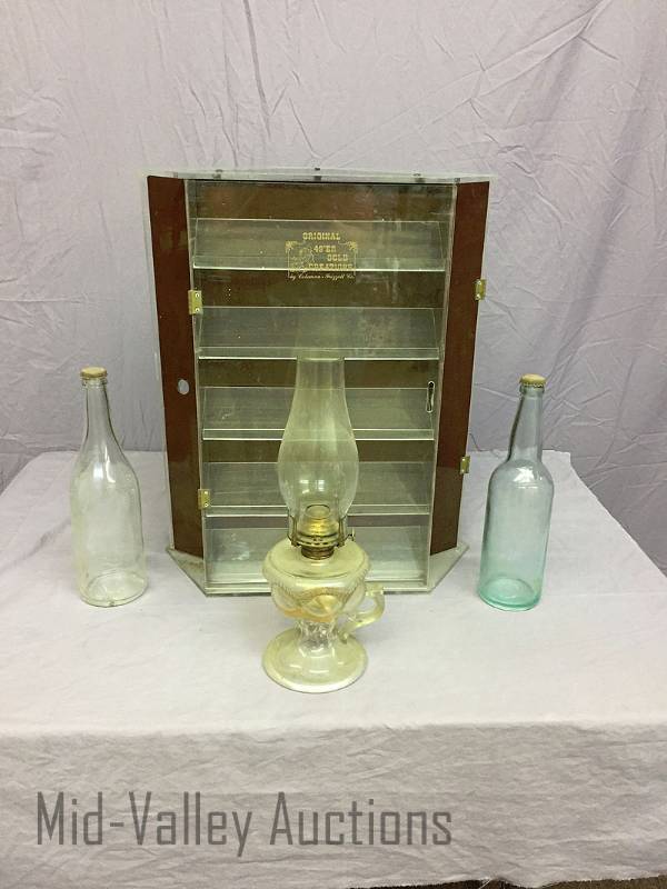 lot 52 image: Glass Oil lamp, bottles and Display Case