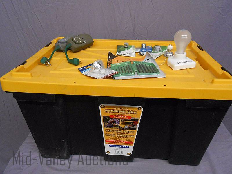 lot 23 image: Strong Box storage tote, drill bits, faucet aerators and other electrical
