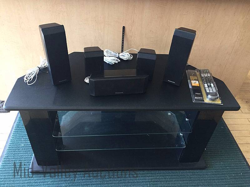 lot 90 image: TV stand, speakers and Universal remote