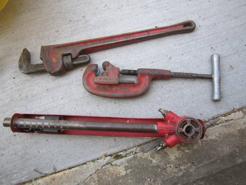 Pipe cutter, threader and wrench...