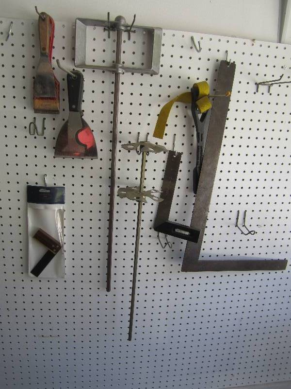 Lot of paint mixers, scrapers, squa...