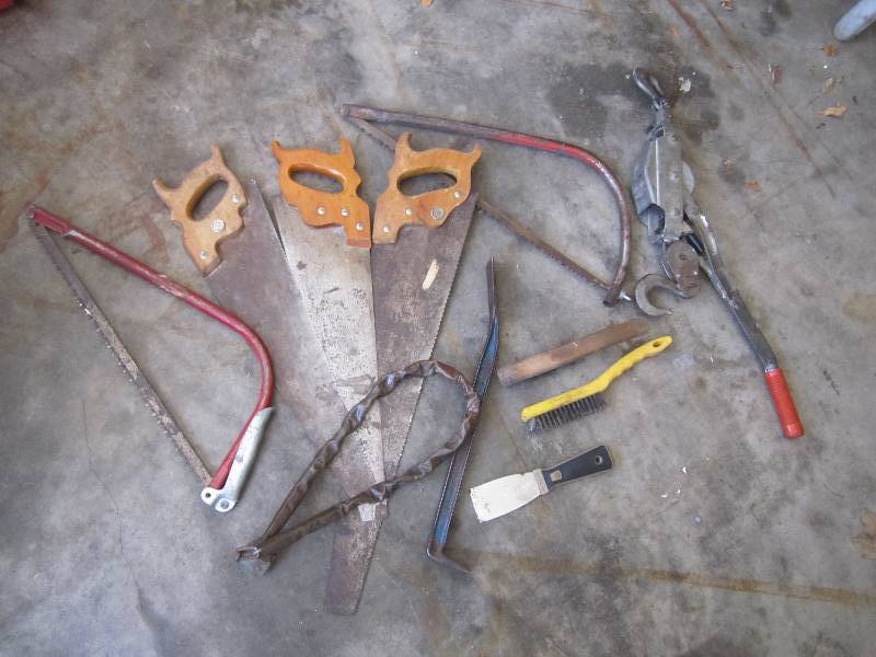 Lot of saws and hand tools...