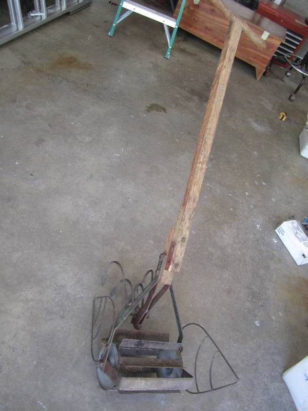 Antique hand tiller...