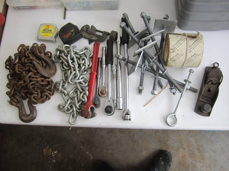 Lot of wrenches and other tools and...