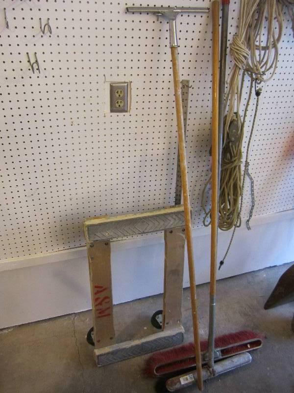 2 brooms, squeegee, moving wheel pl...