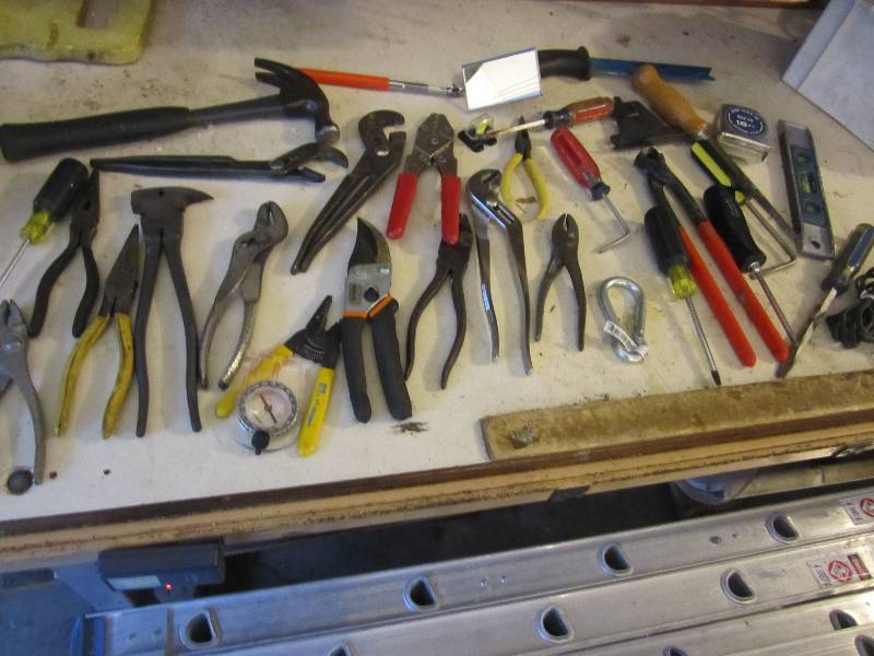 Bucket of pliers and hand tools...