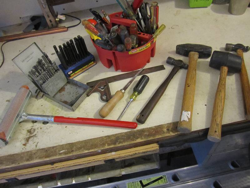 Lot of hand tools, bits and punches...