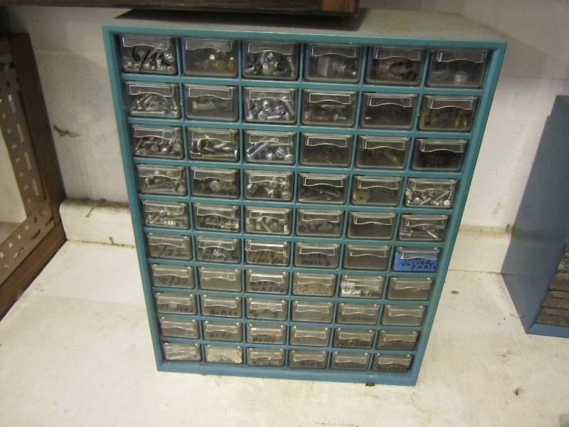 Organizer filled with assorted hard...