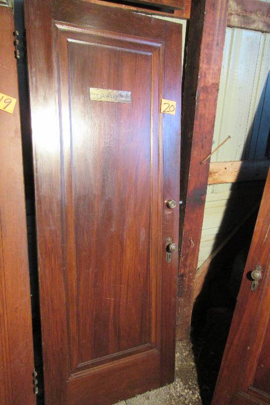 lot 20 image: Walnut wood panel door with hardware as shown
