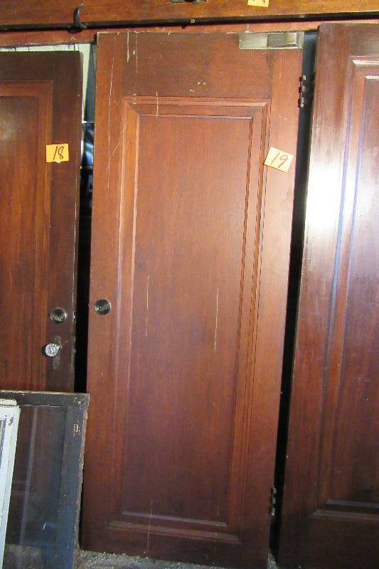 lot 19 image: Walnut wood panel door with hardware as shown