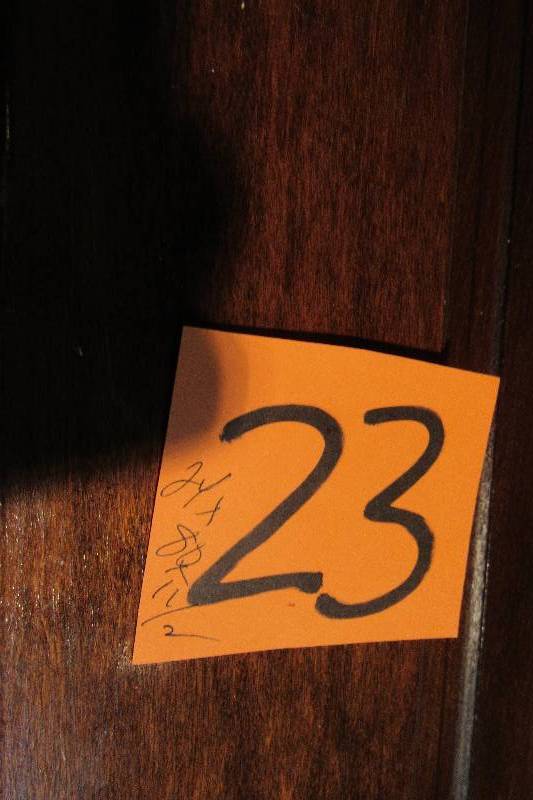 lot 23 image: Walnut wood panel door with hardware as shown