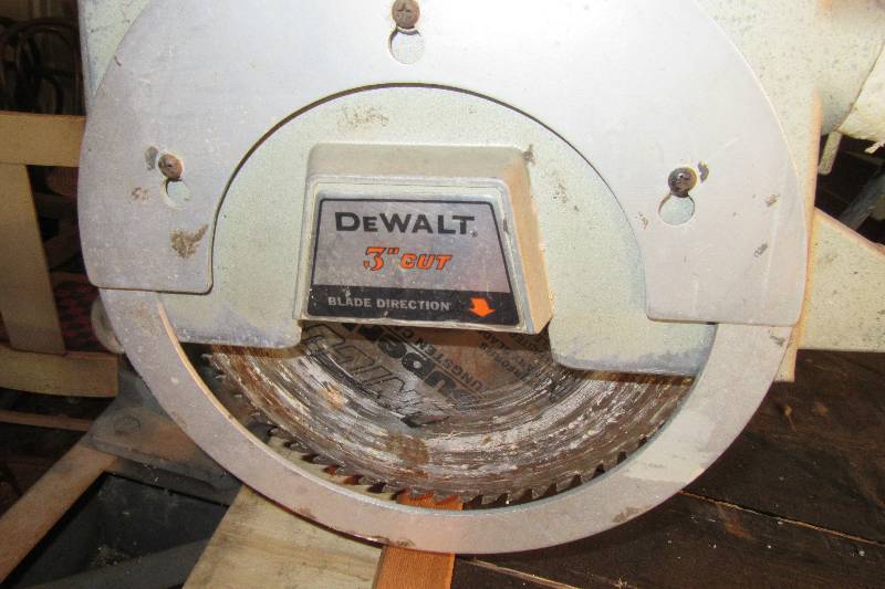 lot 101 image: Black and Decker Radial Arm Saw.    Has a 3 in Cut Dewalt saw head