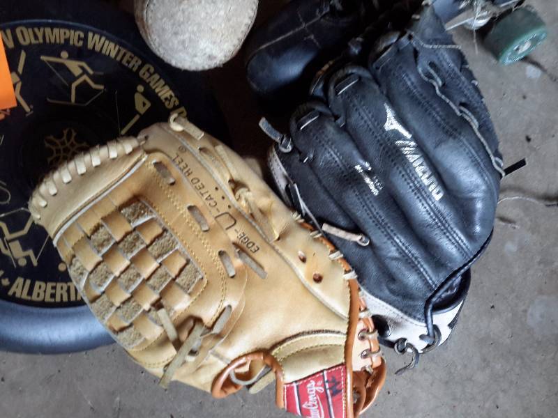 lot 91 image: Misc. Sports and toy items as pictured.  2 baseball gloves