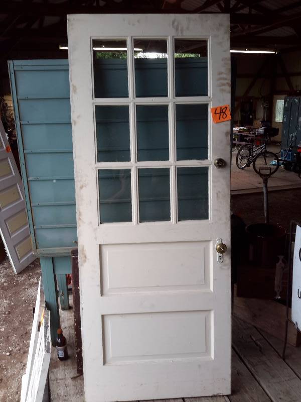 lot 48 image: Very heavy, Solid wood, Exterior door with 2 panels and upper divided lights