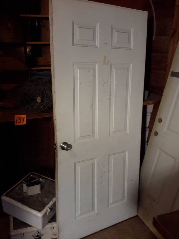 lot 131 image: Metal Clad, Solid core exterior Door with knob
