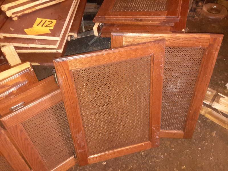 lot 112 image: Wood shelf system with doors as shown