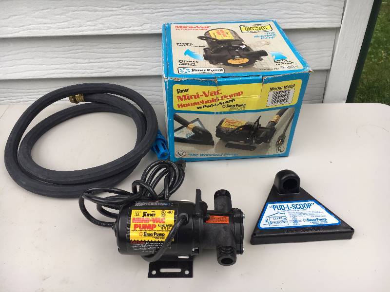 lot 21 image: Simler Mini-Vac Household Pump