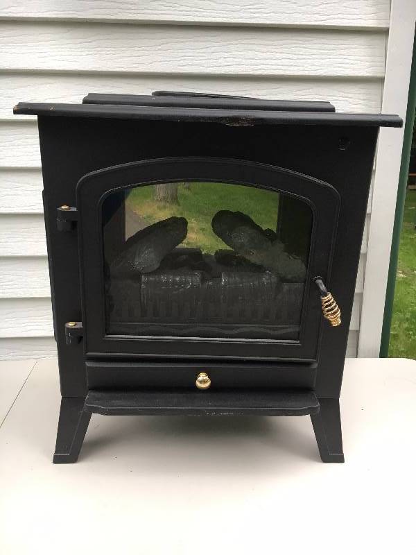 lot 30 image: Electric Fireplace - 1500watts
