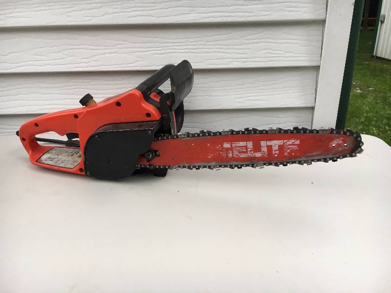 lot 38 image: Homelite Electric Chainsaw 12 blade
