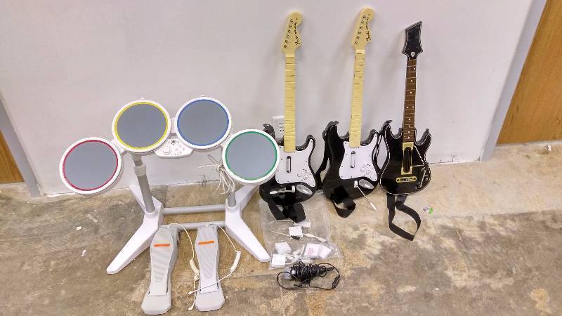 lot 69 image: For Parts - PS4 Controllers, X-Box One Controller, Rock Band & Guitar Hero Bundle