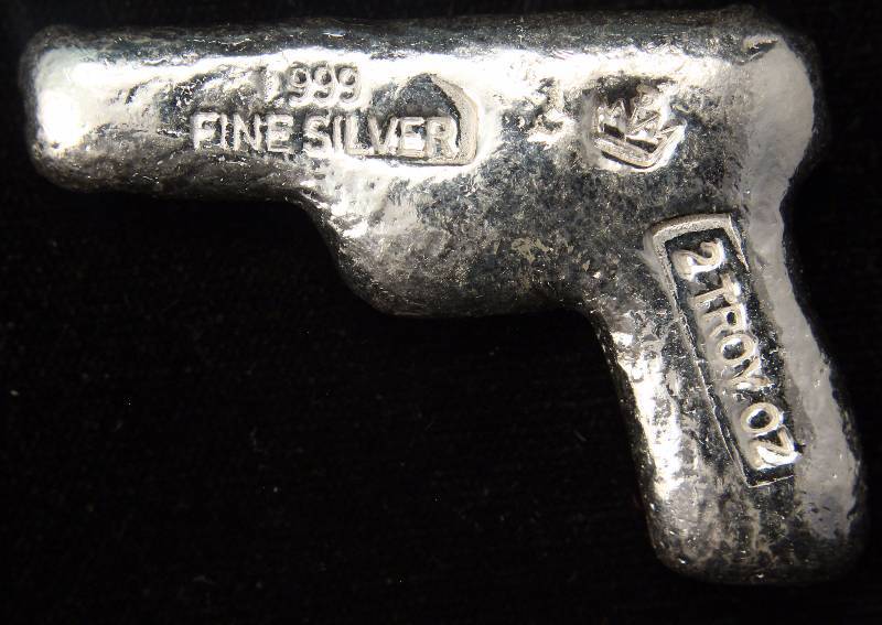 lot 04 image: 2 TROY OZ. .999 FINE SILVER GUN - MONARCH PISTOL