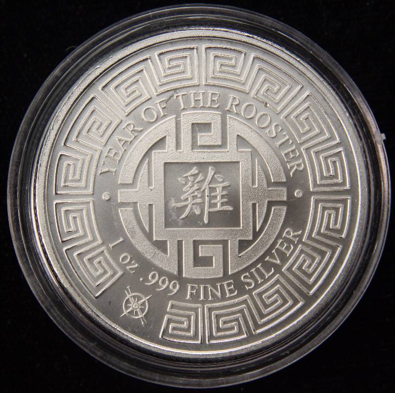 lot 06 image: 1 TROY OZ. .999 FINE SILVER YEAR OF THE ROOSTER IN AIRTITE