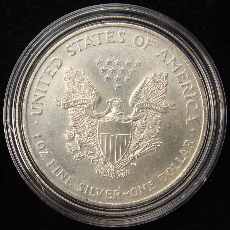 lot 26 image: 1997 AMERICAN SILVER EAGLE 1 TROY Oz. .999 FINE SILVER DOLLAR IN AIRTITE