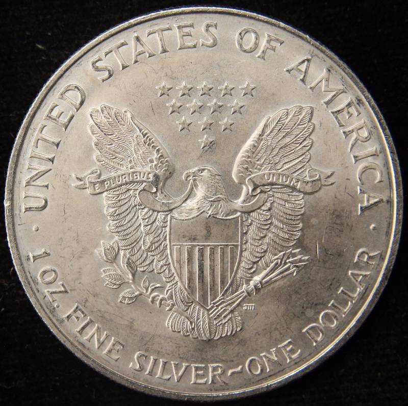 lot 58 image: 1998 AMERICAN SILVER EAGLE 1 TROY OZ. .999 FINE SILVER DOLLAR