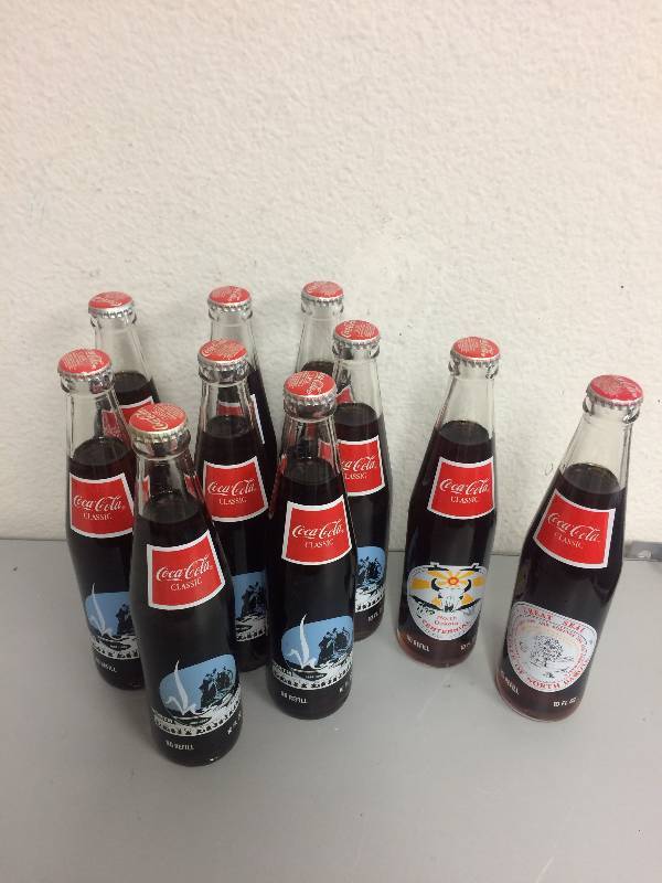 lot 25 image: Coca-Cola ND Bottles
