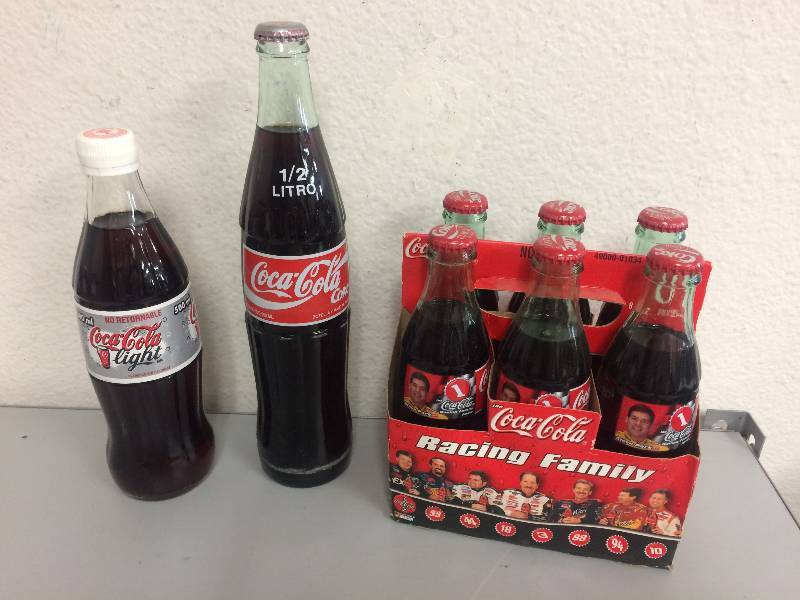 lot 27 image: Assorted Coca-Cola Bottles