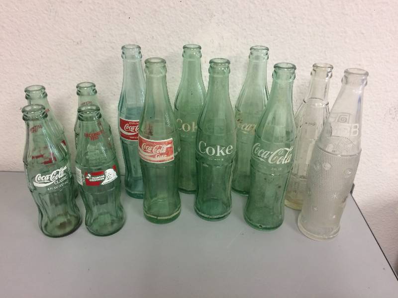 lot 28 image: Assorted Coca-Cola Bottles