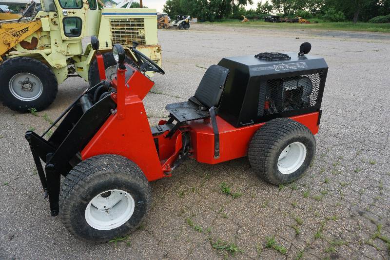 lot 8 image: Power Trac PT-1430 Articulating 4 x 4 Mini Tractor Loader