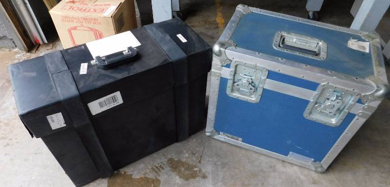 lot 74 image: 2 Equipment Cases- Blue hard sided (approx. 19.5 x 13.5 x 21.5) Black soft sided (approx. 9.5 x 24 x 18.5)