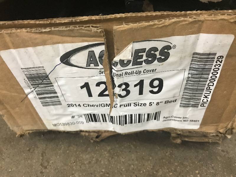 lot 30 image: Tanue Cover for 2014 ChevyGMC Full Size 5 8 Box