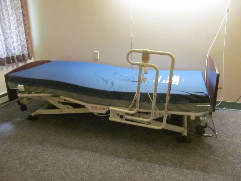 lot 217 image: Invacare bed