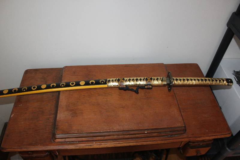 lot 1914 image: Sparkfoam Sword 39 Foam Samurai Sword GoldBlack Handle wSheath w Case