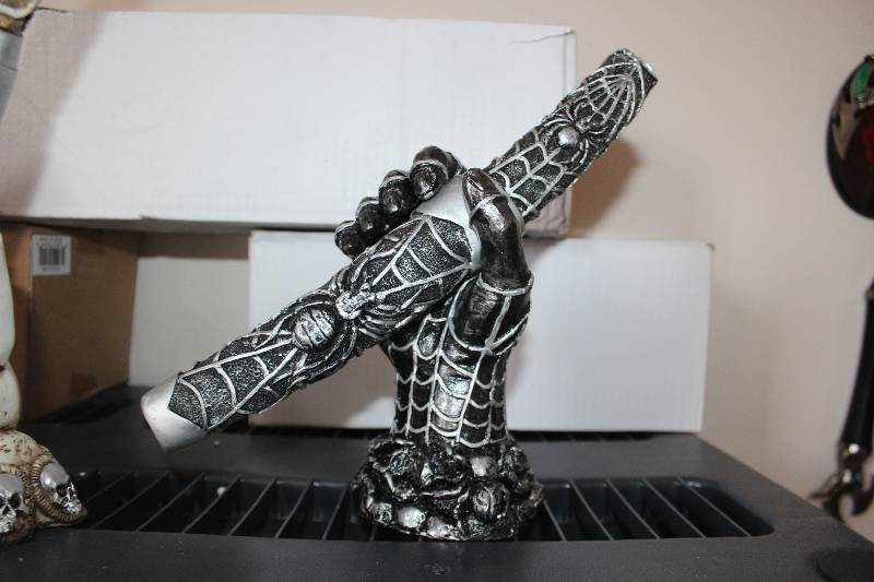 lot 1942 image: Hand Sculpture w Sheathed Knife