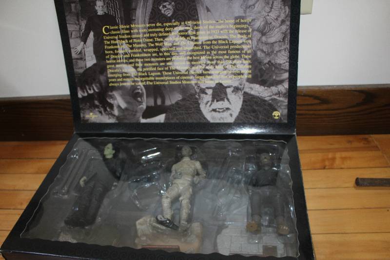 lot 2201 image: Frankenstein, Mummy, Werewolf Figurines w Display