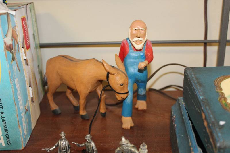 lot 2057 image: Lot of (2) Guy And His Ass Figurine