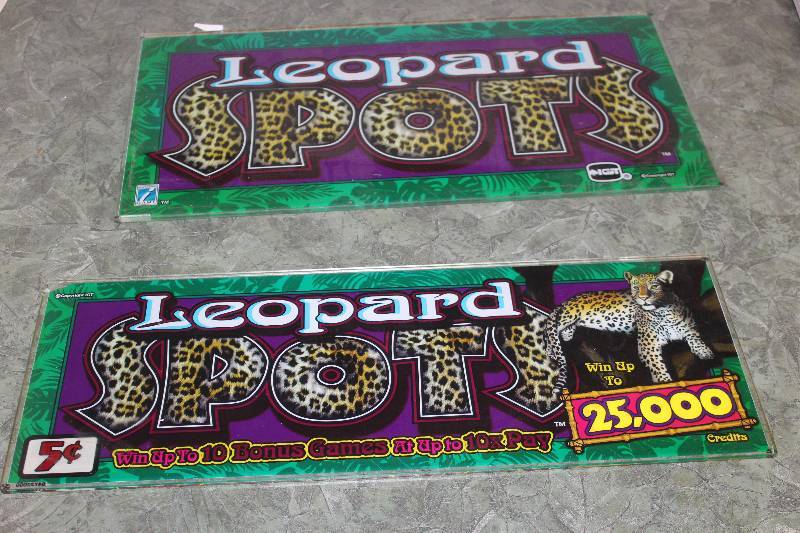 lot 2043 image: Lot of (2) Leopard Spots Decorative Wall Art